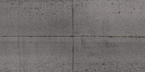 panorama view from above on surface texture of old asphalt road with cracks