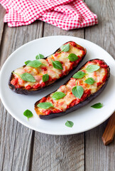 Baked eggplant with cheese mozzarella, tomatoes and basil. Healthy eating. Italian food. Parmigiana di melanzane.