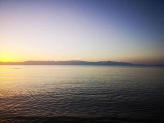 Fototapeta na wymiar sunset over the sea, minimal background