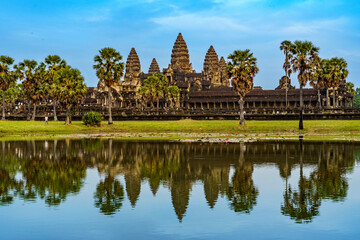 Fototapeta na wymiar Cambodia. Siem Reap Province. Angkor Wat (Temple City) and its reflection in the lake. A Buddhist and temple complex in Cambodia and the largest religious monument in the world