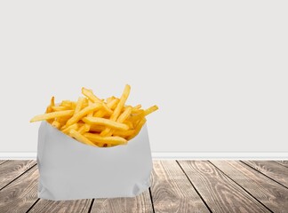 Tasty fast food French fries in bag