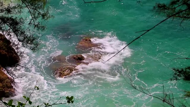Nai Thon Naithon Beach view behind trees Phuket Thailand.