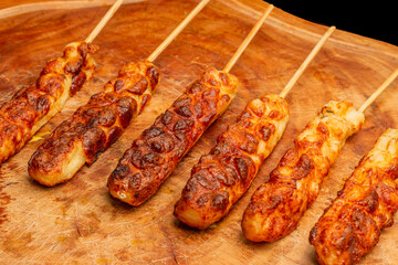 delicious cheese kebab, baked cheese, on the table, made in the fire