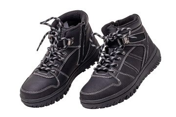 Winter boots. Close-up of a pair elegant black leather winter boots with laces and rivets isolated on white. Clipping path. Macro. Autumn shoe fashion for child boy.