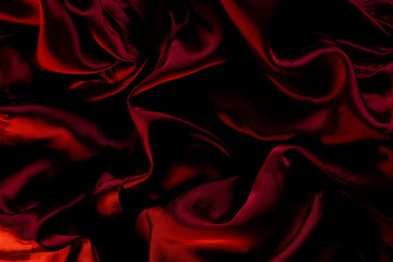 Red wavy fabric as a background, red