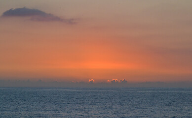 Naklejka na ściany i meble orange sunset over the sea