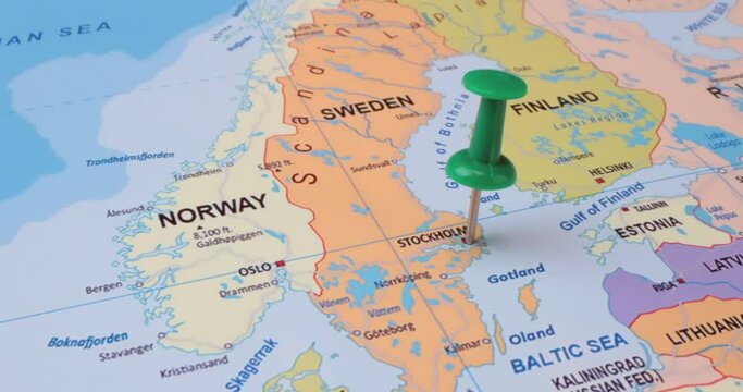 Sweden - Travel concept with green pushpin on the world map. The location point on the map points to Stockholm the capital of the Sweden.