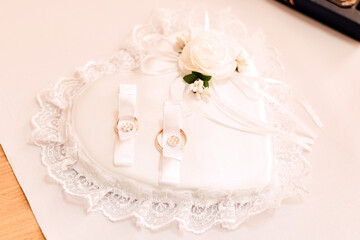 Gold wedding rings. Wedding day, attributes, accessories