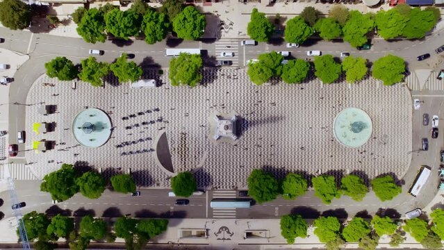 Aerial view over the Square King Pedro IV, Lisbon, Portugal. Cinematic 4K