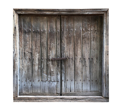 vintage wooden barn door with weathered wood dark texture and metallic lock and bolts isolated on white