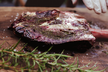 Preparing a Tomahawk steak for grill. 