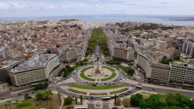 Aerial view of Marquis of Pombal Square (Praca do Marques de Pombal), Lisbon, Portugal. The bronze statue of Sebastiao Jose de Carvalho e Melo, better known as the Marqu&ecirc;s of Pombal. Cinematic 4K