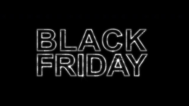 Black Friday text written in silver sparkle lights effect isolated on black background, lighted sign for promotional banner or advertising, shopping and sale concept, introductory theme of marketing