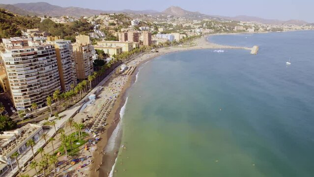 Aerial view of Malagueta Beach, Malaga, Spain. Cinematic 4K