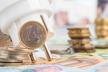 Euro money and electrical plug, concept of energy crisis, increase of prices and inflation