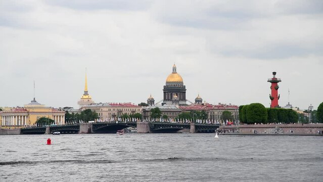 Cityscape of Saint Petersburg city, Russia. Saint Isaac's Cathedral (or Isaakievskiy Sobor) in the background. Grey rainy cloudy sky. Real time video. Travel in Russia theme.