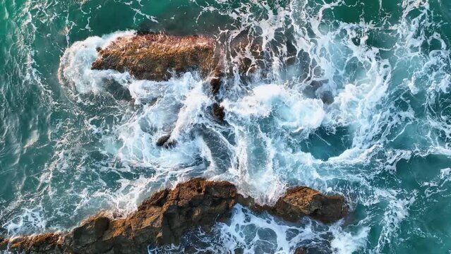 The texture of the stone beach at sunset 4 K