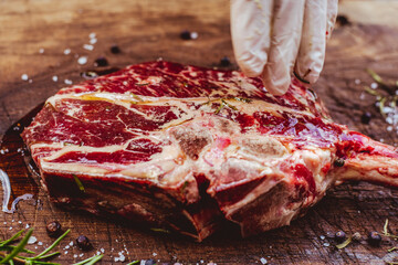 Raw Tomahawk steak