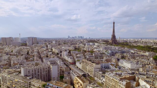 Aerial view of Tour Eiffel Tower and Seine River bridge traffic cars driving, Paris city attractions, France. Cinematic 4K