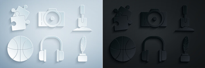 Set Headphones, Shovel in the ground, Basketball ball, Feather and inkwell, Photo camera and Piece of puzzle icon. Vector