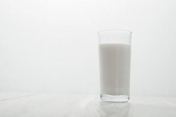 One glass milk on white background. drink milk