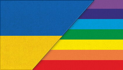 Flag of Ukraine and lgbt. Ukrainian and lgbt flags on fabric surface