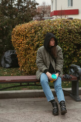 portrait of crying young woman on the street
