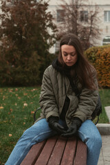 portrait of crying young woman on the street