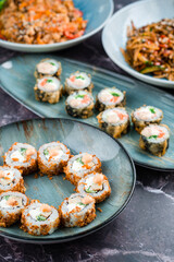 Hot tempura roll with salmon and cheese, Traditional delicious sushi roll set. Sushi menu