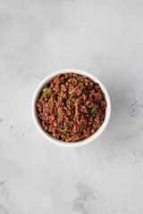 Homemade Mixed Olive Tapenade Appetizer in a Bowl, top view. Flat lay, overhead, from above.