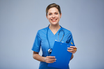 Female nurse holding blue chart for medical history. Isolated portrait.