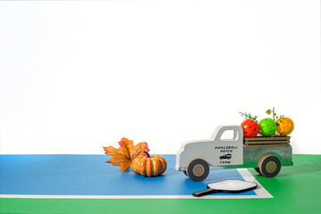 Pickleball truck delivering for thanks giving.  With colorful Pickleballs anf fall decorations on...