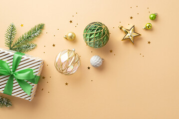 Christmas Eve concept. Top view photo of transparent white gold green baubles star ornament present...