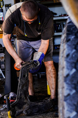 worker with hand saw