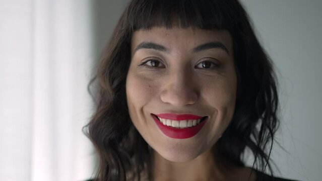 Portrait of a Brazilian woman with Indigenous traits smiling. One happy South American hispanic person