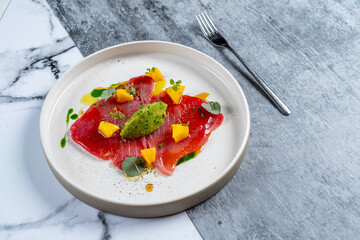 red fish on a plate, pesto, dish