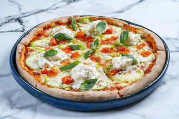 pizza with stracciatella on a white background