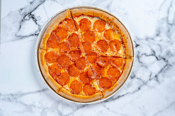 pizza with salami on white background