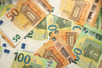 euro banknotes and coins