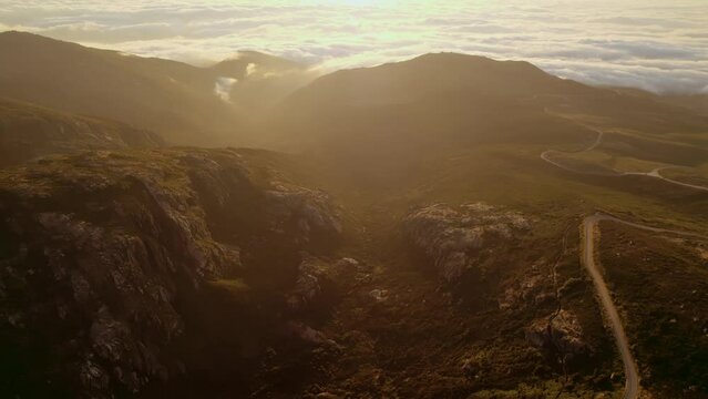 Aerial view of the "Serra da Estrela", Star Mountain Range, natural park. Glacier valley and mountain landscape, an iconic natural landscape on north Portugal. Cinematic 4K