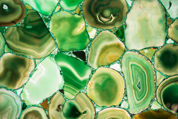 Beautiful background with green agate slices - obrazy, fototapety, plakaty