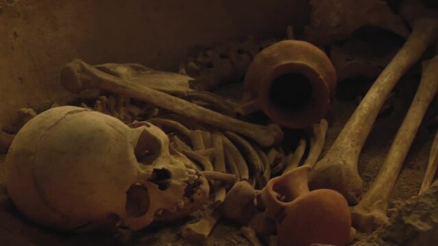Remains Of An Ancient Burial In A Clay Sarcophagus With Human Skull And Skeleton