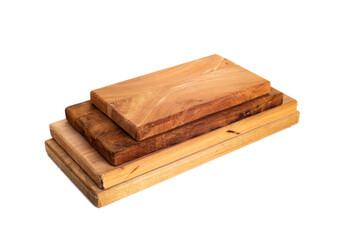 stack of wooden cutting boards of various sizes isolated on white background.