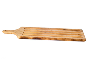 wooden cutting board with grooves for blood and fat on a white background. kitchen utensils concept