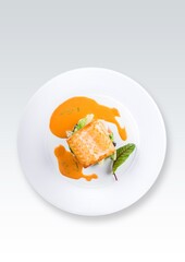 Naklejka na ściany i meble Fresh tasty fish fillet dish on the plate