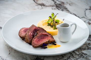 grilled beef steaks with spices