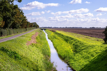 View of a channel in the Fens on a beautiful autumn day, Lincolnshire, East Midlands, England