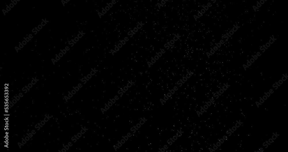 Sticker particles floating on black background in slow motion overlay. atmosphere filmed with red camera