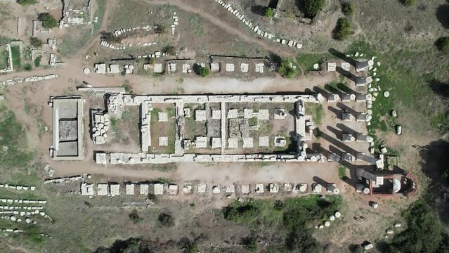 Aerial view with drone; Sardes (Sardis) Ancient City which has gymnasium and synagogue ruins and columns in Manisa, Turkey.
