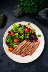 duck fillet with fresh vegetable salad